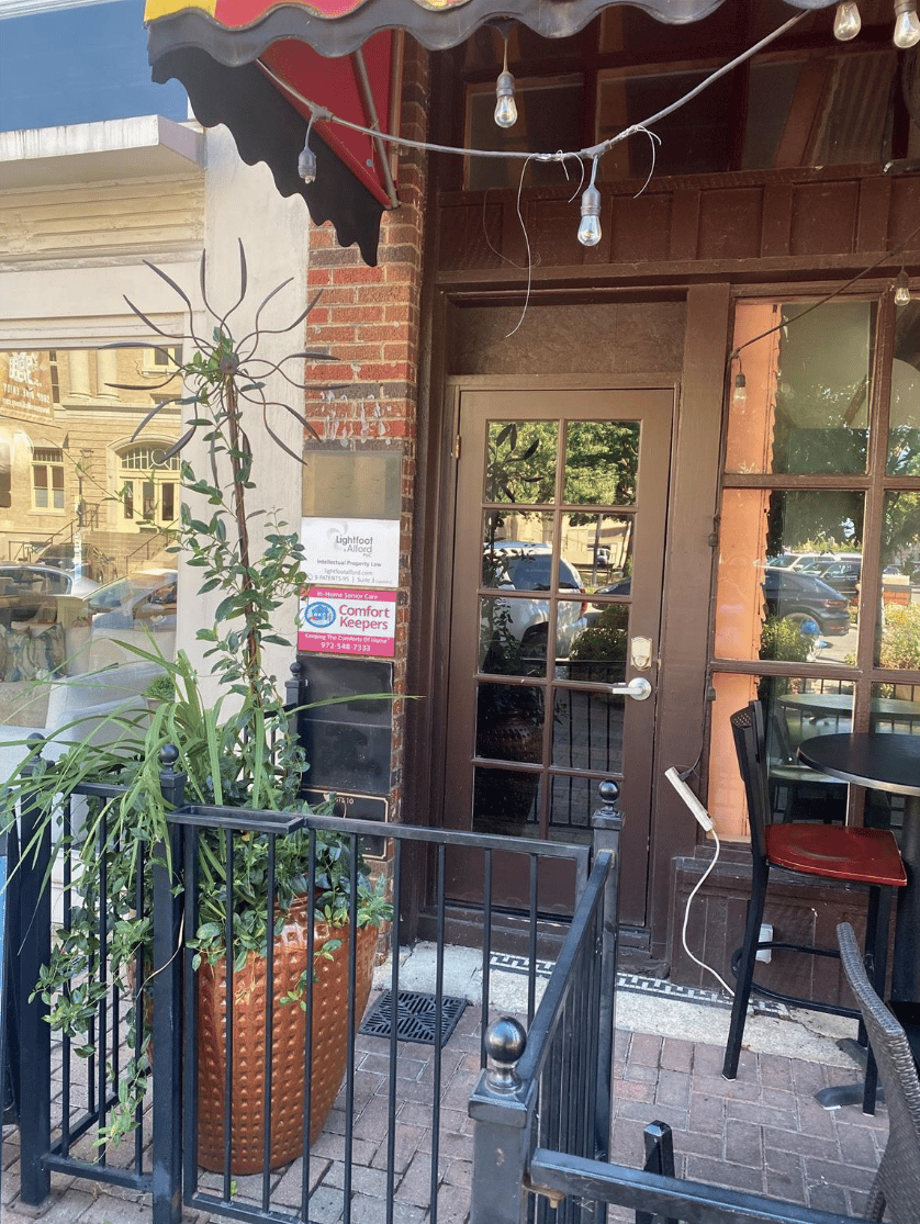 Downtown McKinney pedestrian activity viewed from office suite windows
