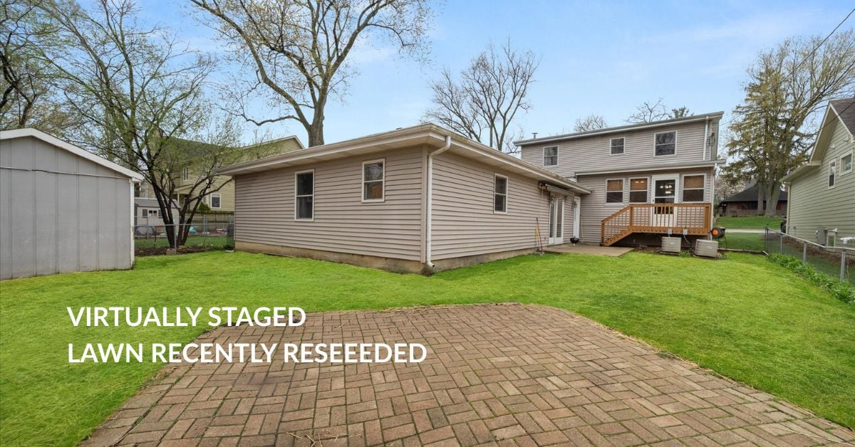 Rear yard with brick paver patio and spacious lawn at 4217 Elm St Downers Grove IL 60515 listed by the Tully Team