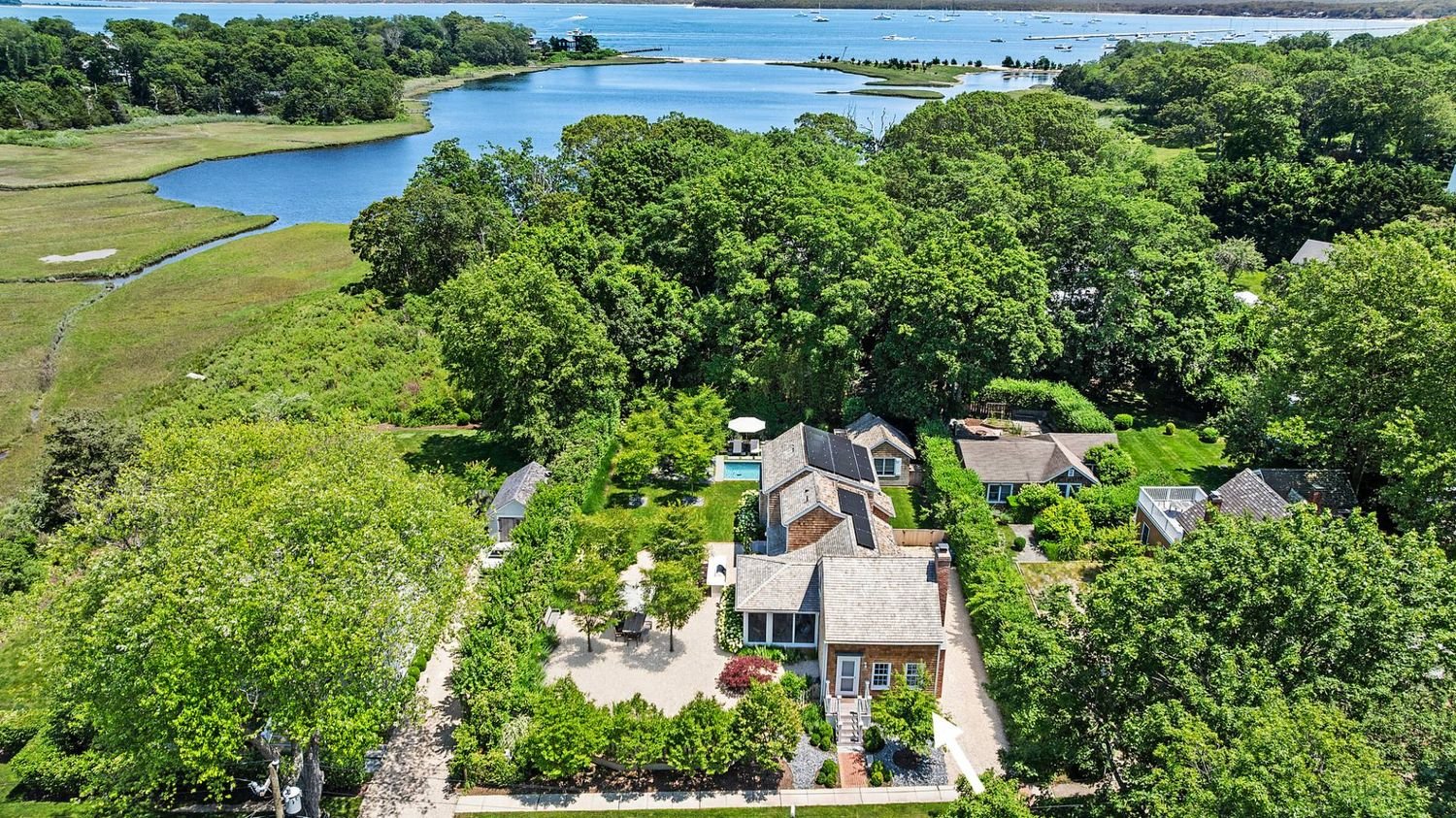 Modernized Vintage Cottage with Knockout Backyard, Moments to Village Main