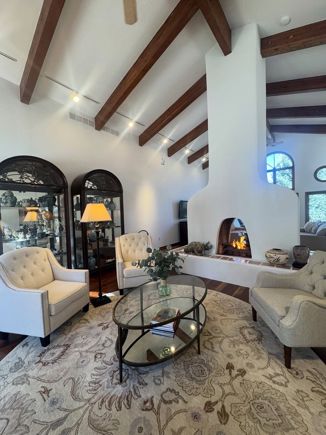 Realtor from Meridian Group previewing a modern kitchen in a Castle Rock, CO home, checking details with notepad for buyers