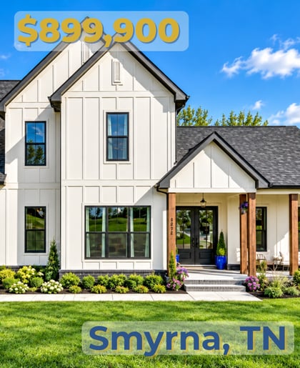 White modern farmhouse in Smyrna, TN, with black-framed windows, covered porch, and $899,900 price.