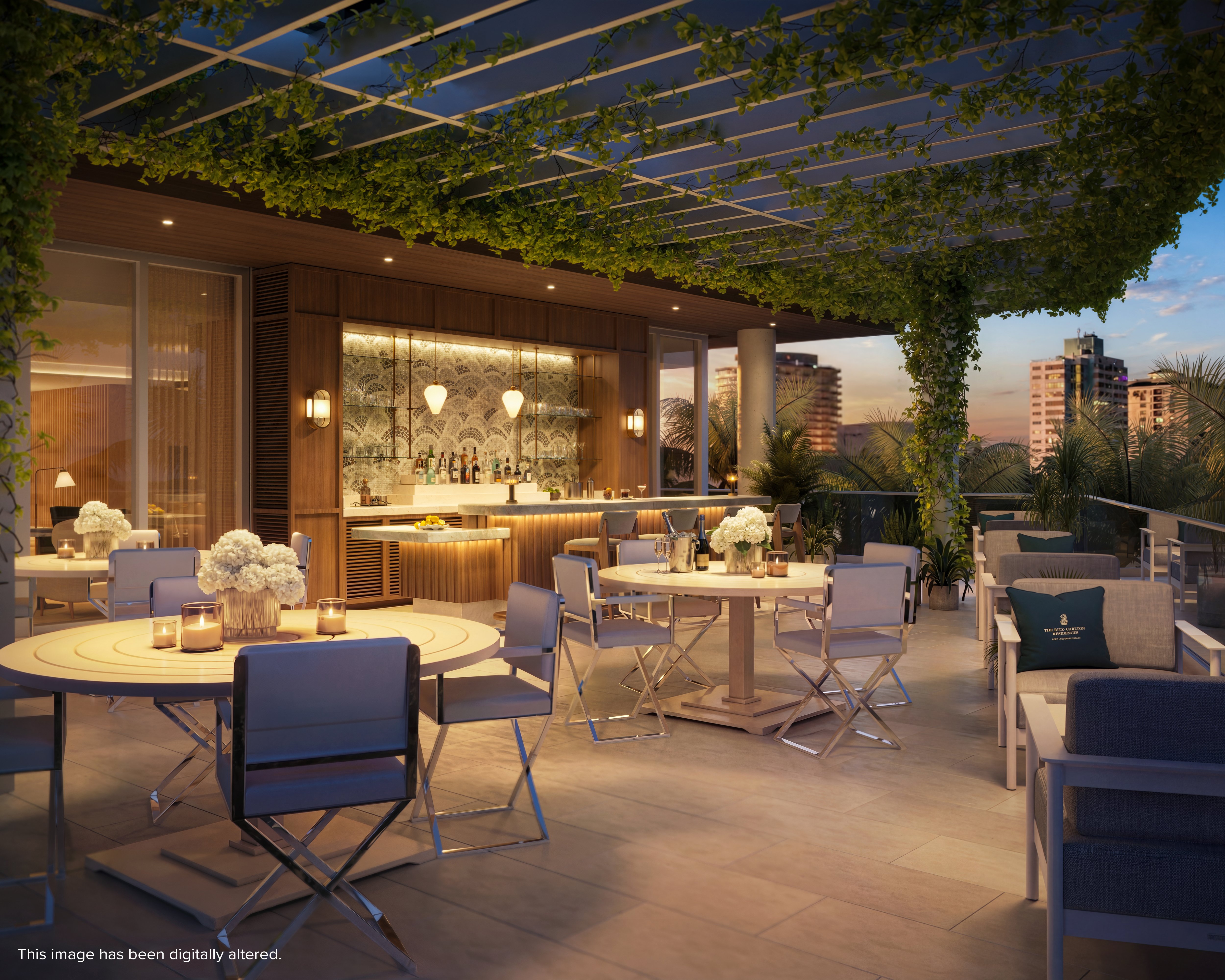 Rendering of a rooftop terrace with a bar, dining tables and a pergola overlooking Fort Lauderdale at dusk