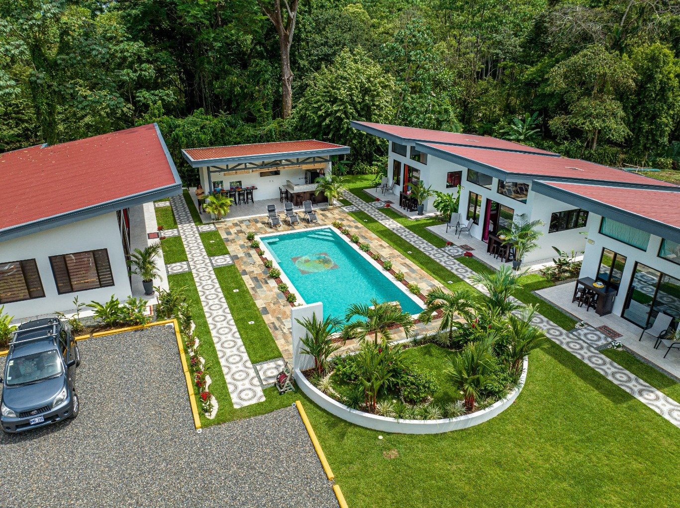 Incredible turnkey investment opportunity, 3 Rental villas, and a 2 Bedroom Home with a large pool.