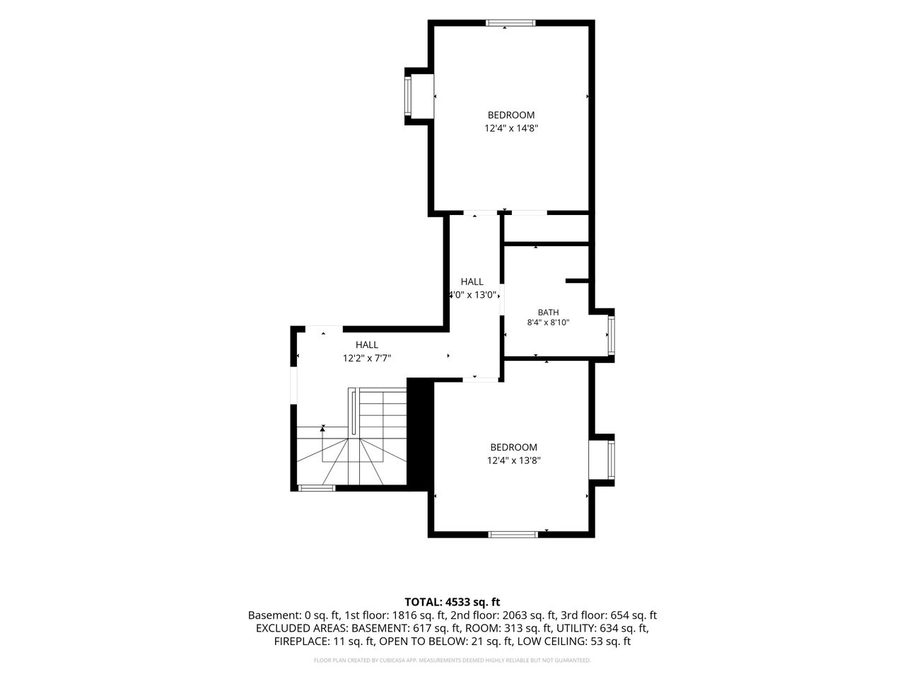 Floor plan showing two bedrooms, a bathroom, halls, and staircase, with a listed total area of 4,533 square feet.