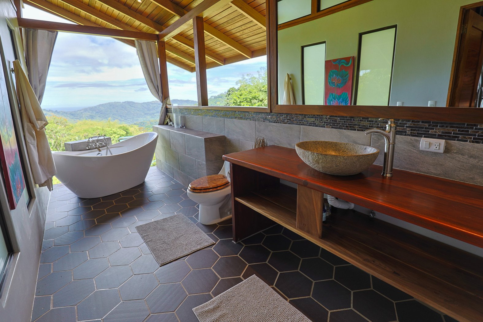 TROPICAL RETREAT IN PLATANILLO – OCEAN VIEW HOME PLUS APARTMENT IN ESTABLISHED COMMUNITY – 0.88 ACRES