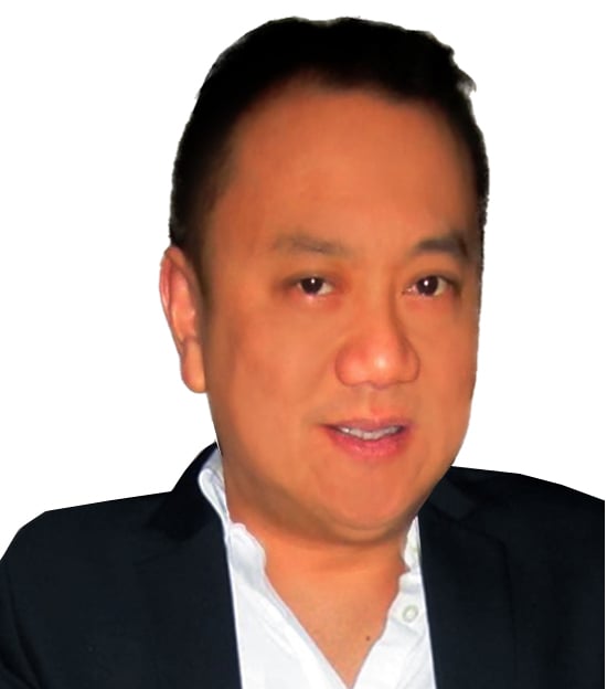 Mark Santa Ana in a dark jacket and white shirt.