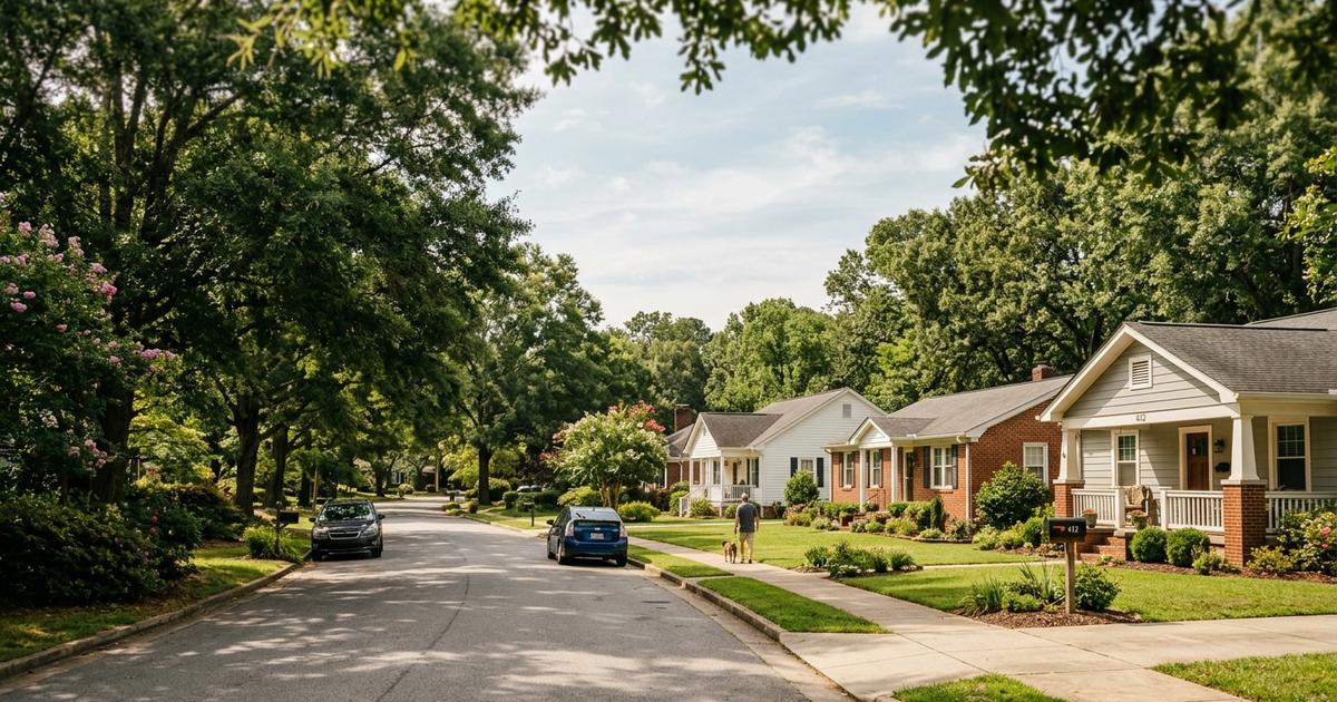 Tree-lined residential street in the Cary Woods neighborhood of Auburn, Alabama.