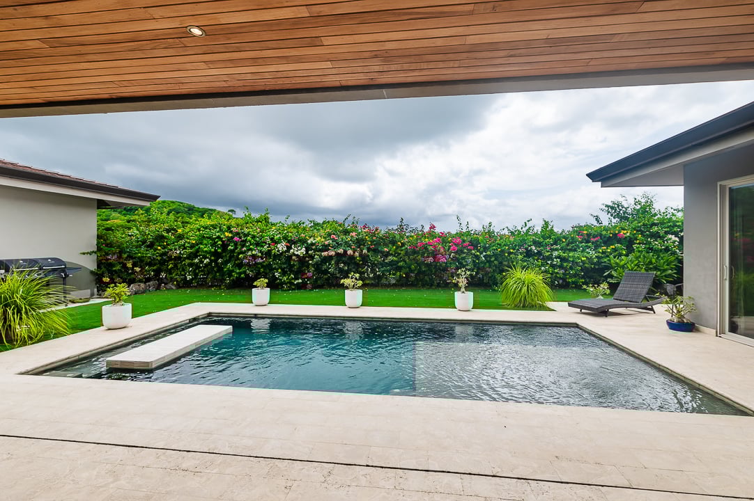 Casa Coralina | Elegant Home in Top Gated Community with Private Pool, Lush Gardens, & Incredible Amenities.  Located on a Double Lot w/ Ocean View!