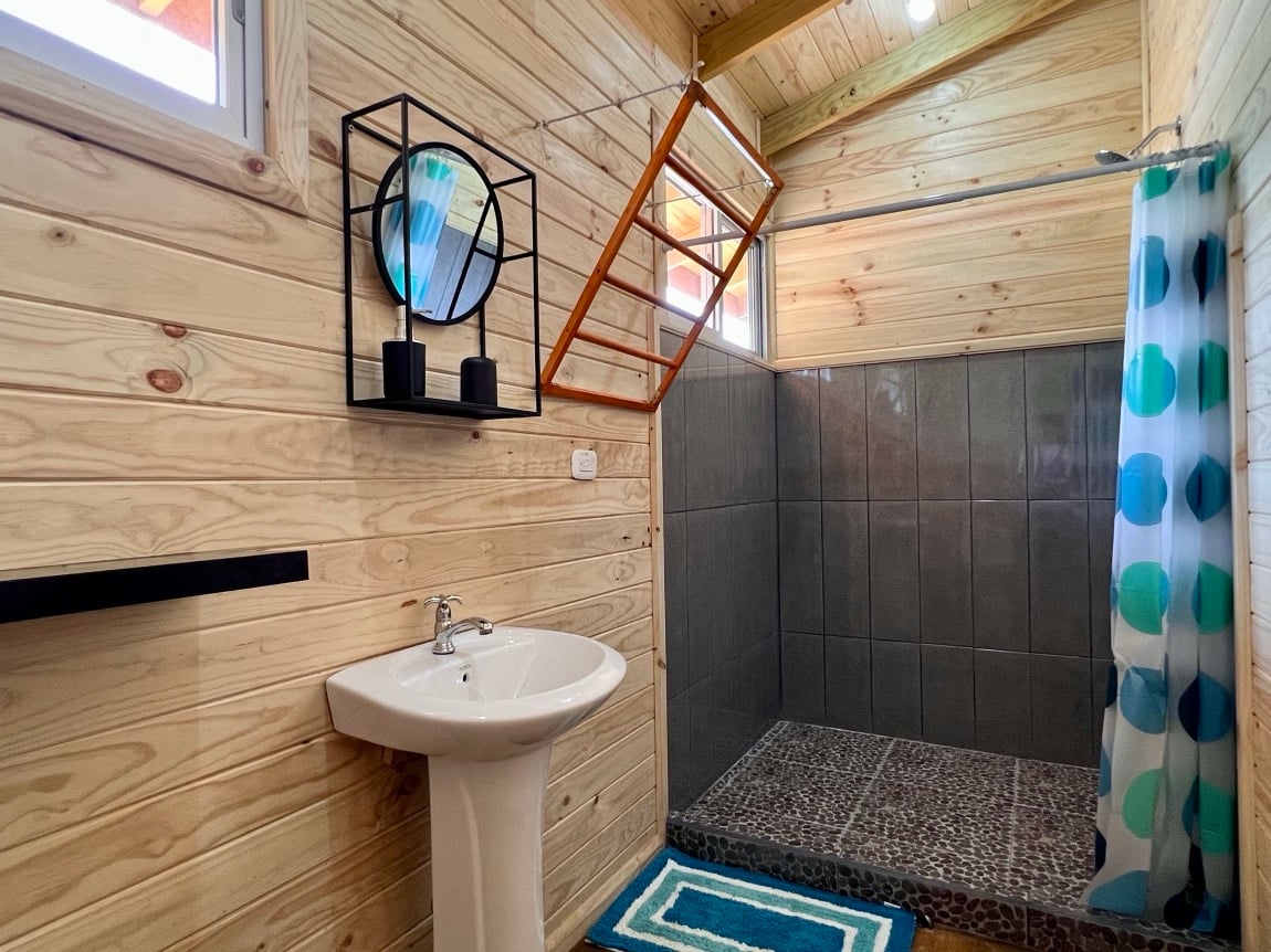 Eco-Luxury Home and Cabins with Waterfall, Ocean Views, and Organic Farming Potential
