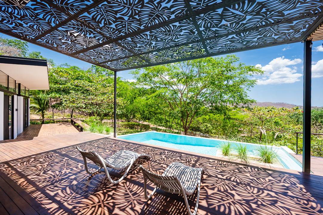 Casa Kalachuchi | Gorgeous Modern Jungle Oasis with Sunset Views in Gated Community