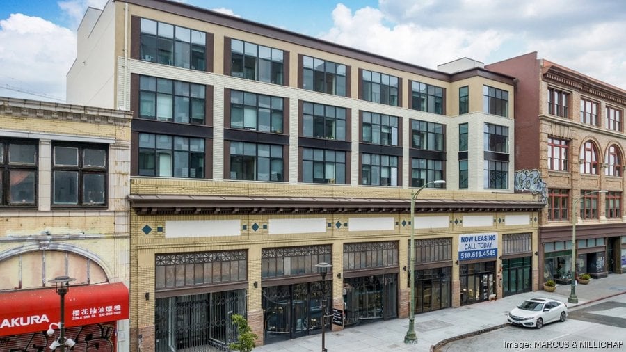 Downtown Oakland apartment building sells for less than half what it cost to develop
