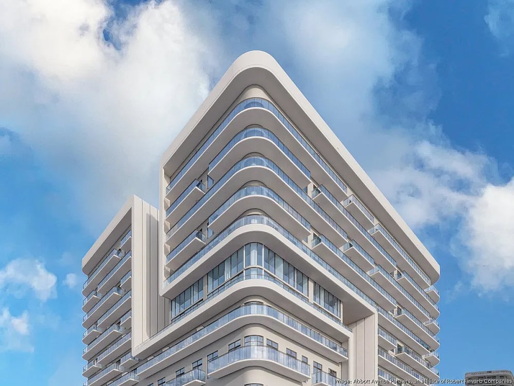 NoBe PARC high-rise with rounded corners, white bands, and glass balconies.