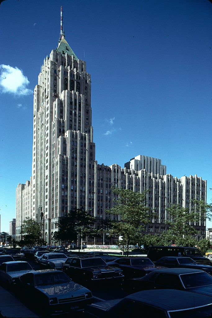 Detroit’s Fisher Building, a landmark Art Deco tower with a green pyramidal roof.