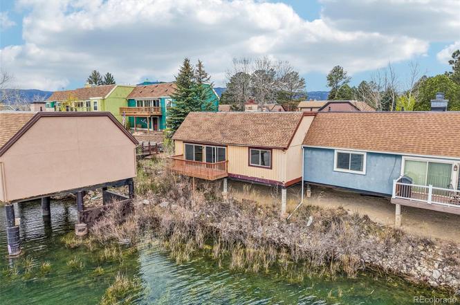 Lake Woodmoor Investor Special – Rare 1-Bed Lakeside Townhome with Huge Upside