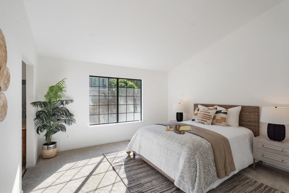 Bright bedroom with natural light in Village East Petaluma home