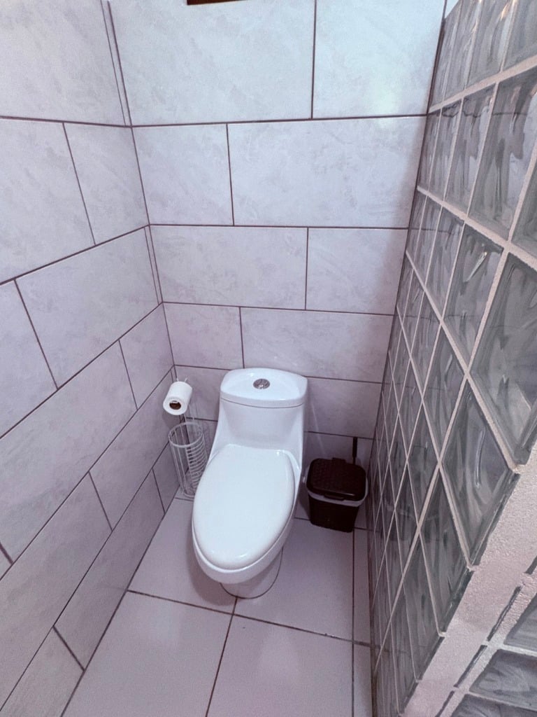 Move in ready 2 bedroom / 2 bathroom home with window ocean view and pool in Ojochal.