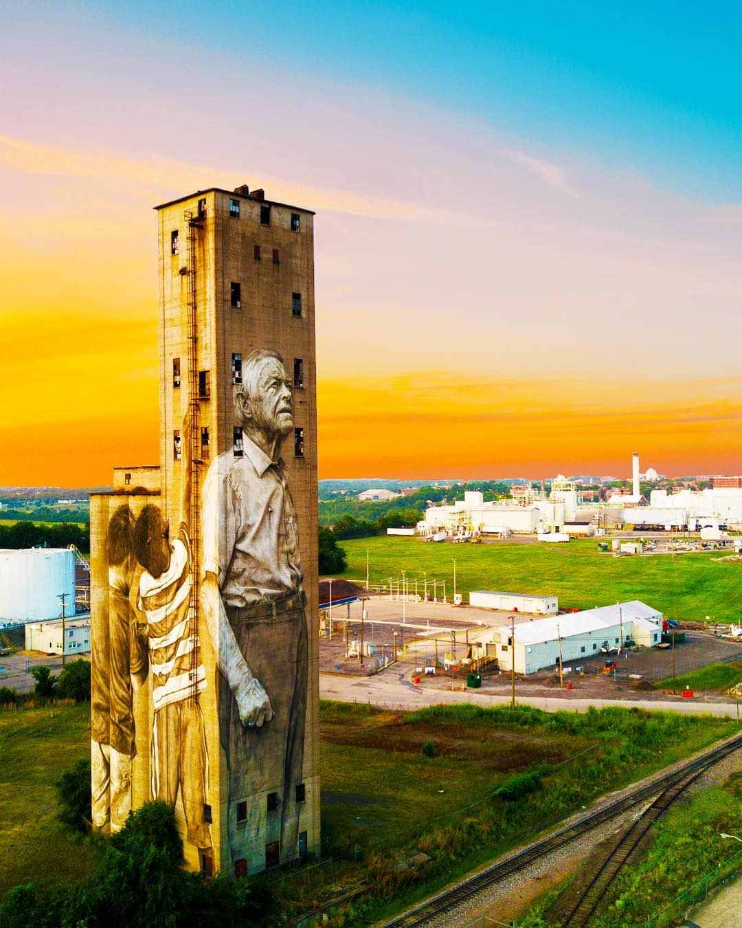 The Nations silo mural in Nashville, bold artwork on a tall concrete structure.