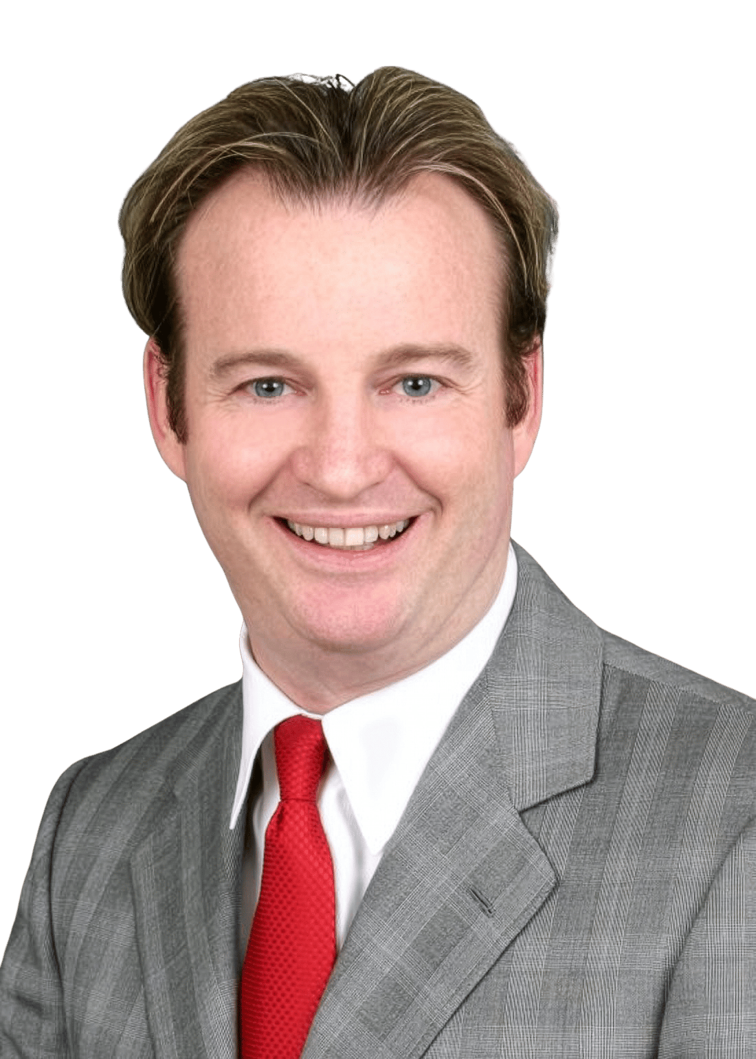 Mike Schults smiling in a gray plaid suit and red tie