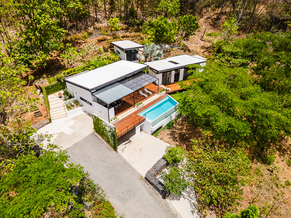 Casa Kalachuchi | Gorgeous Modern Jungle Oasis with Sunset Views in Gated Community