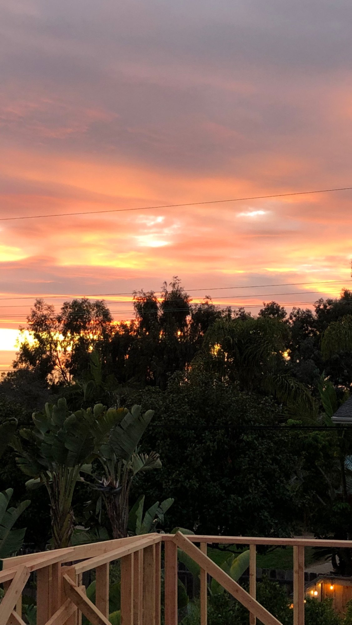 Sunrise over framed ADU construction in Cardiff, Encinitas—elevated ocean view project in early build phase