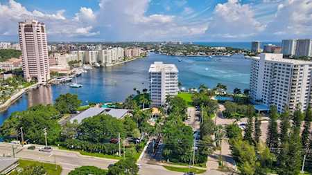 Aerial view of East Boca Raton’s waterfront, with high-rises lining a wide waterway.