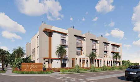Architectural rendering of a modern residential building with balconies and palm landscaping.