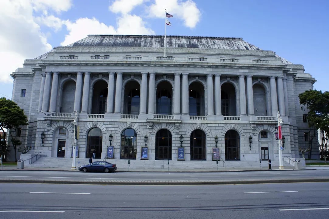 The grand exterior facade of the historic War Memorial Opera House in San Francisco's Civic Center district.