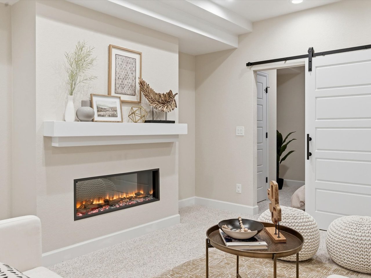 Modern Colorado living room with contemporary fireplace representing a home for sale and explaining how real estate commission works in Colorado.