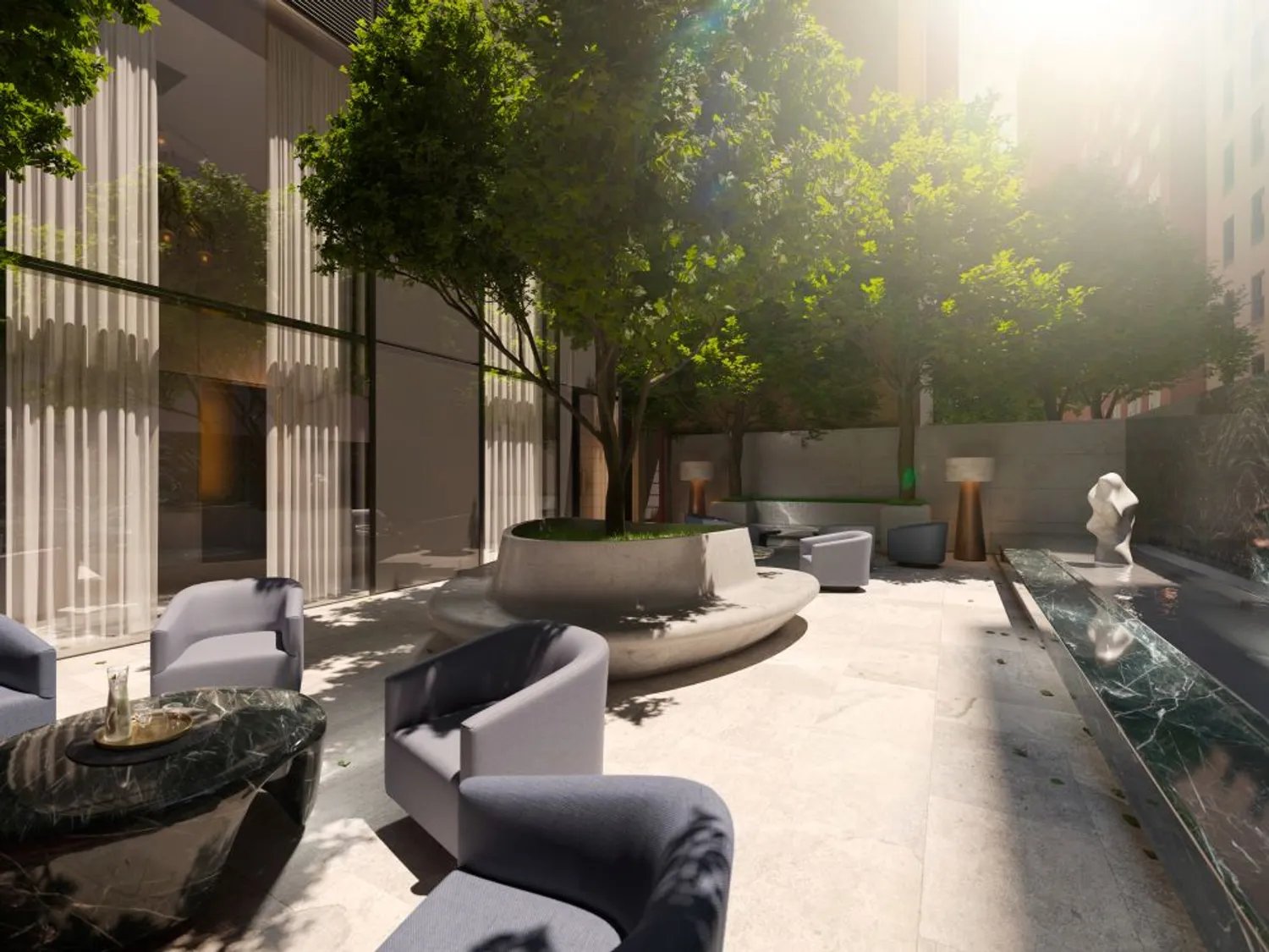 Sutton Tower courtyard with modern lounge seating, mature trees, and a reflecting pool.