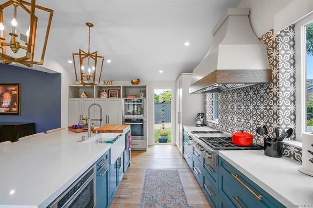 Designer kitchen in a coastal modern home in Encinitas, California featuring top-end appliances and custom cabinetry
