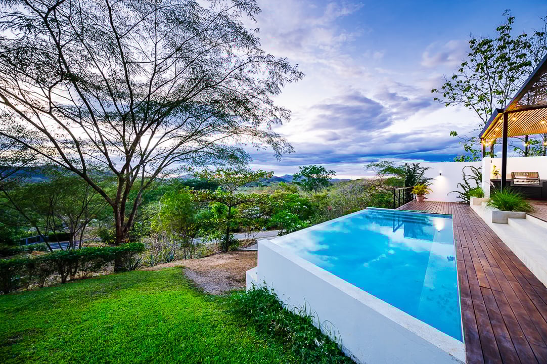 Casa Kalachuchi | Gorgeous Modern Jungle Oasis with Sunset Views in Gated Community