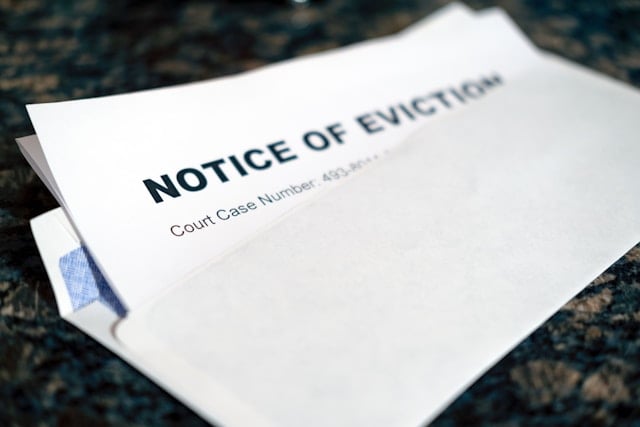 an-eviction-notice-open-on-a-counter-top