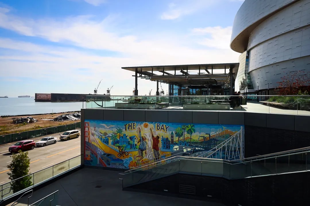 A vibrant mural depicting a basketball scene with 