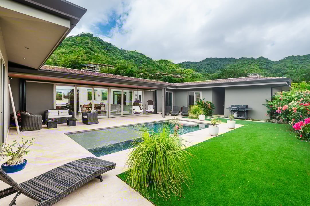 Casa Coralina | Elegant Home in Top Gated Community with Private Pool, Lush Gardens, & Incredible Amenities.  Located on a Double Lot w/ Ocean View!