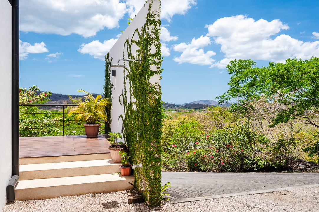 Casa Kalachuchi | Gorgeous Modern Jungle Oasis with Sunset Views in Gated Community