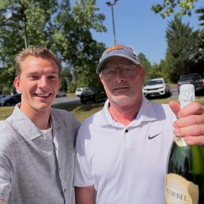 Aaron celebrating with a client