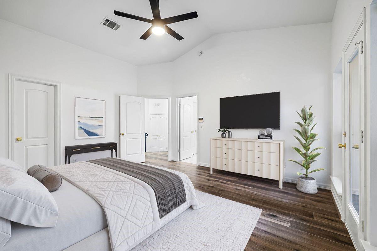 Guest bedroom with wood-look floors, Barton Hollow, Westlake, Austin.