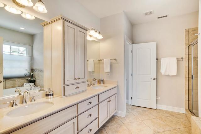 You'll treasure the space and style of this classic Hinsdale home