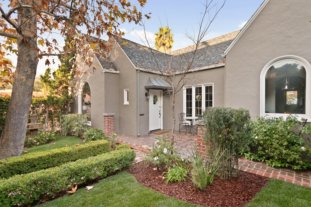 Updated and romantic Country English nestled privately in the Franklin Hills 