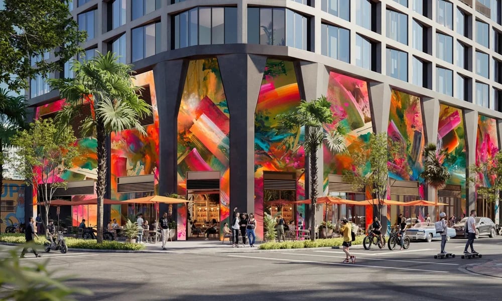 The Cloud One Residences with colorful abstract artwork across its street-level façade.