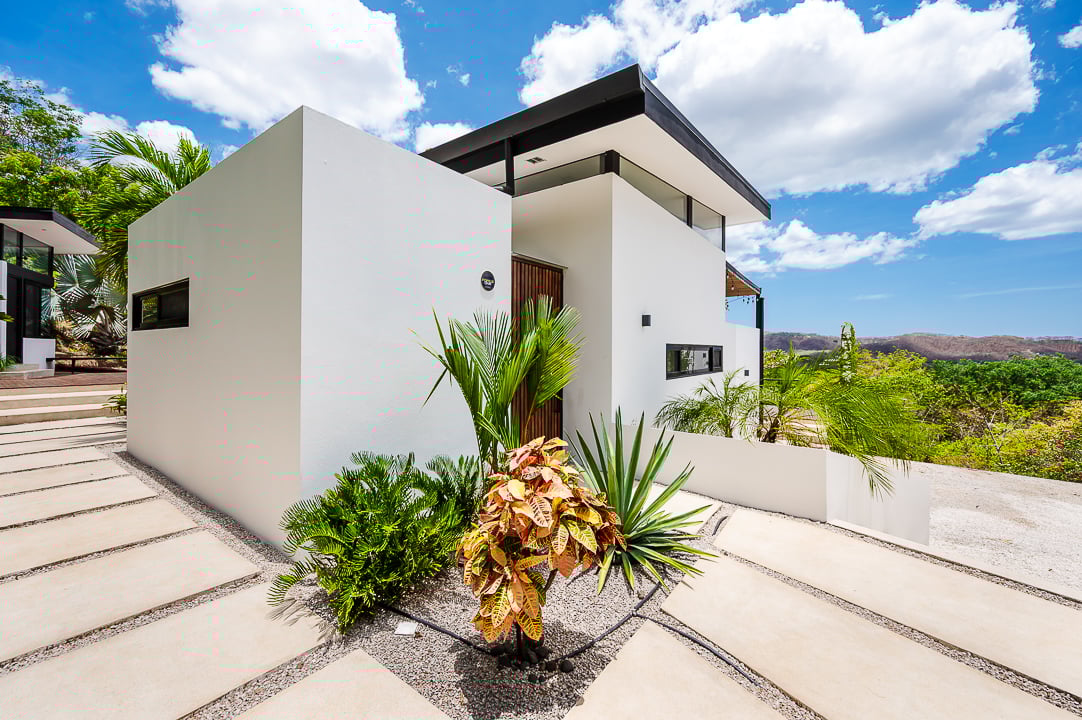 Casa Kalachuchi | Gorgeous Modern Jungle Oasis with Sunset Views in Gated Community
