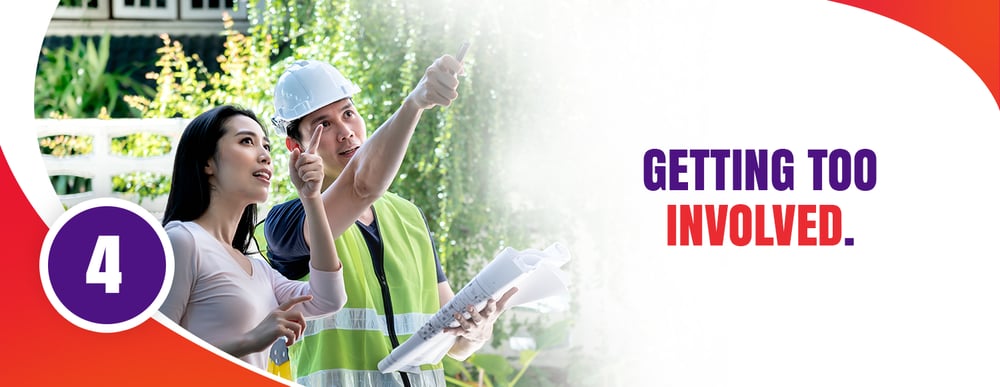 Home inspection tip 4: Getting too involved; a woman and inspector review an inspection document.
