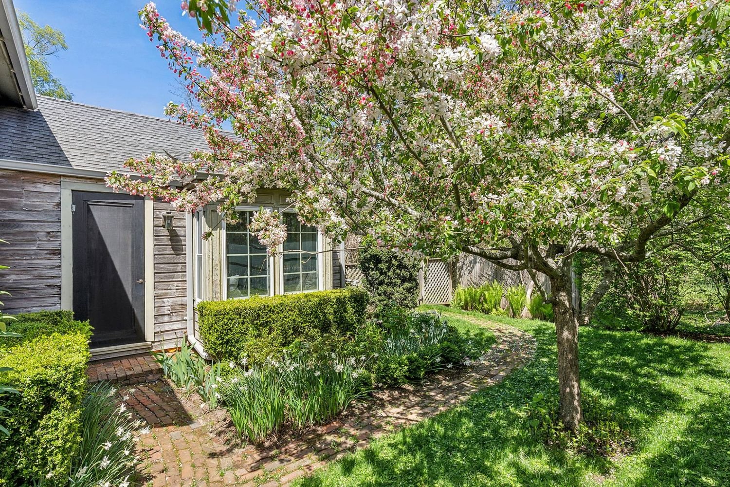 A Historic Village Classic in Coveted Redwood, With Pool