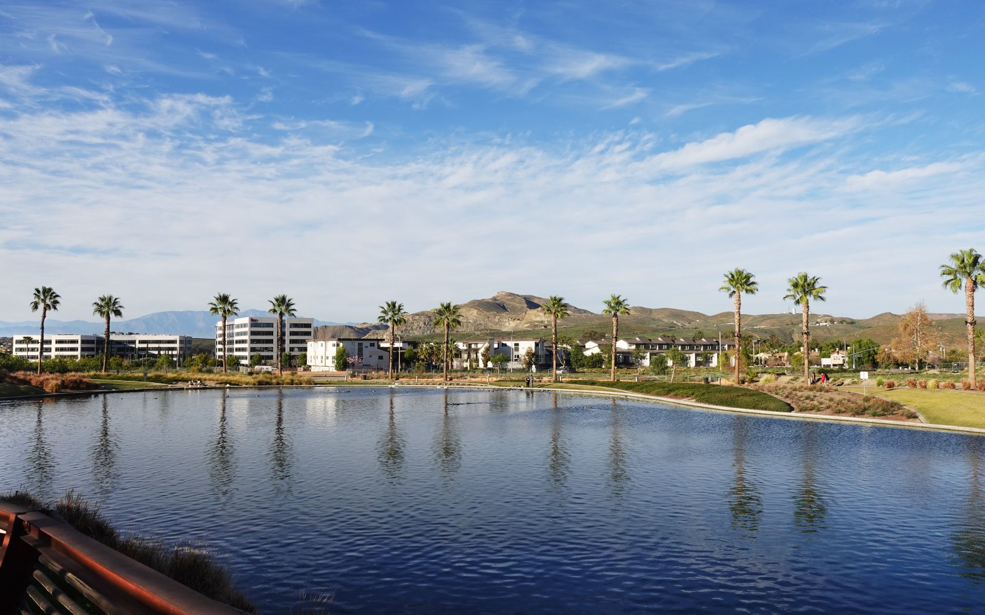 Corona, California neighborhood with mountain backdrop and suburban homes