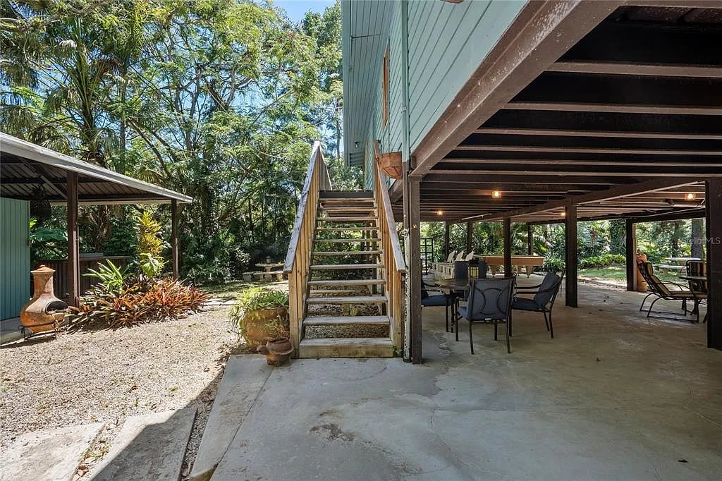 Outdoor stairs leading to covered patio