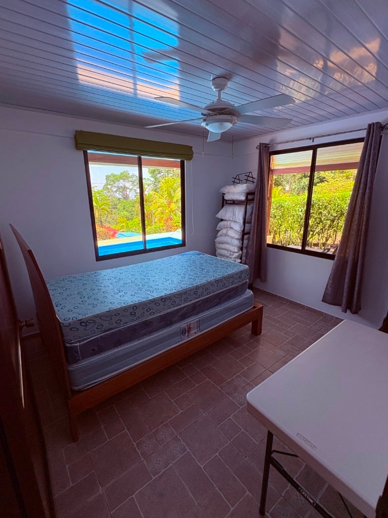 Move in ready 2 bedroom / 2 bathroom home with window ocean view and pool in Ojochal.