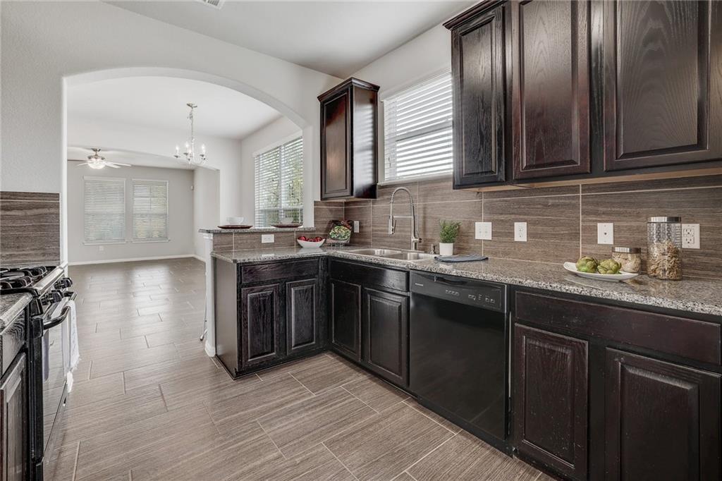 Modern Corner Lot Townhome in Coveted Carrington Court!