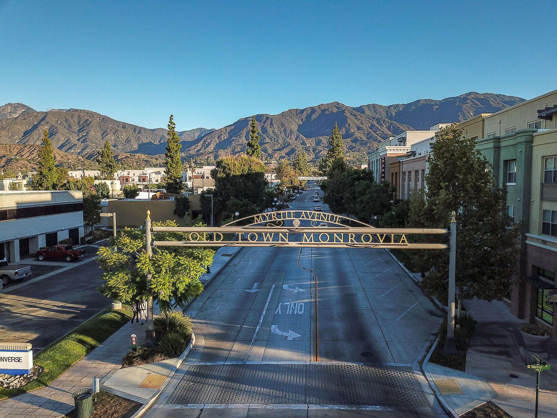 Myrtle Avenue and the Old Town Monrovia gateway with the San Gabriel Mountains beyond