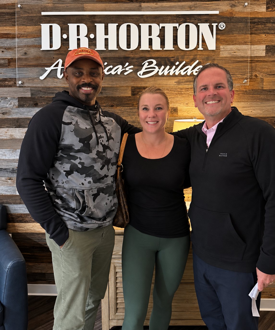 Sarah and Dem celebrating their new home with Team Becker