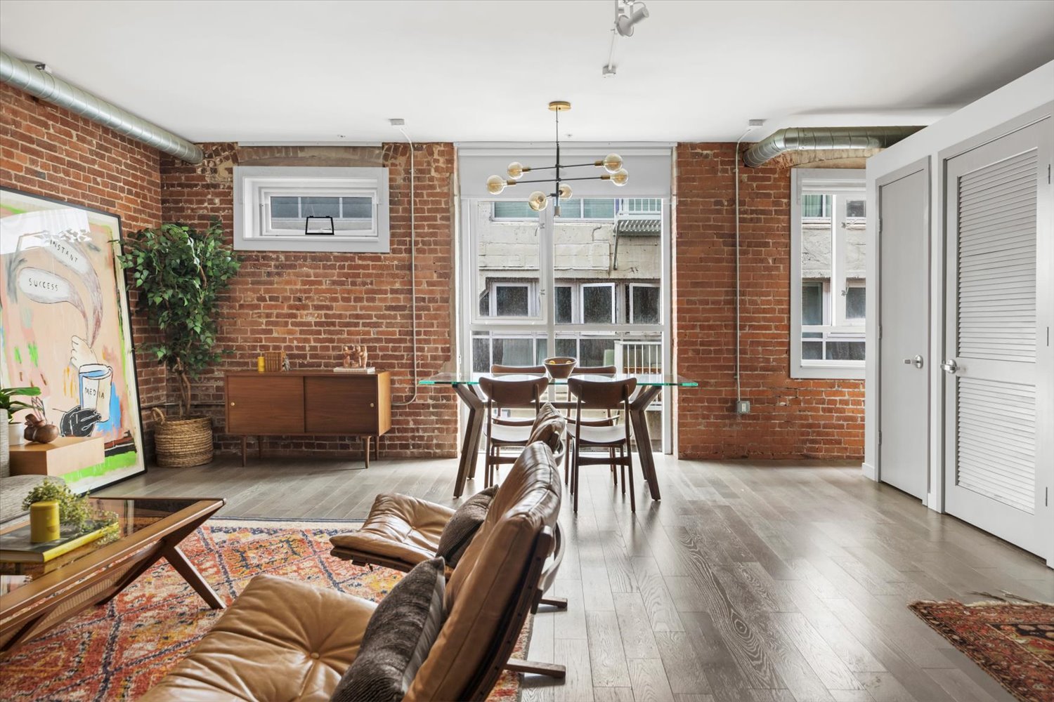 Breathtaking Exposed Brick & Beam Loft at THE BARKER BLOCK